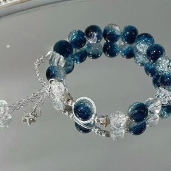 Galaxy Enchantment: Stardust Beaded Bracelet with Silver Charms